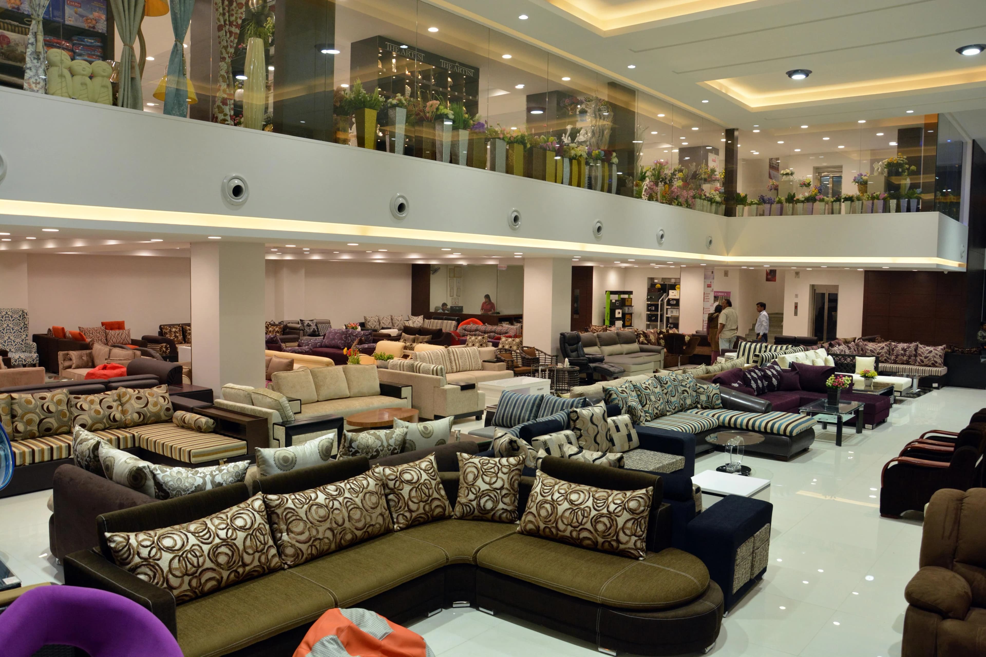 JJ Wood showroom with living room and furniture arrangements